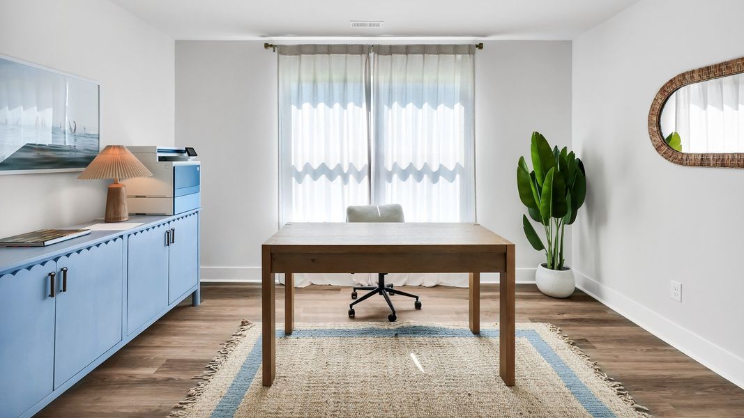 Furnished interior in a model home at Merchant Point in Jacksonville (Image 16).