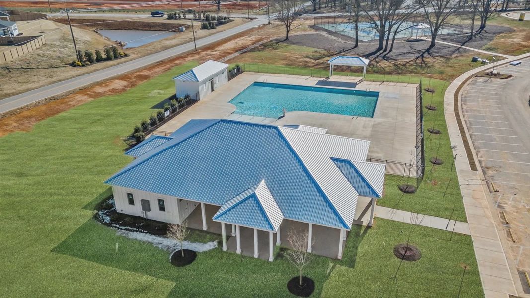 Amenities center with large pool at Village at Midway by DRB Homes in Anderson, SC Amenities center with large pool at Village at Midway by DRB Homes in Anderson, SC