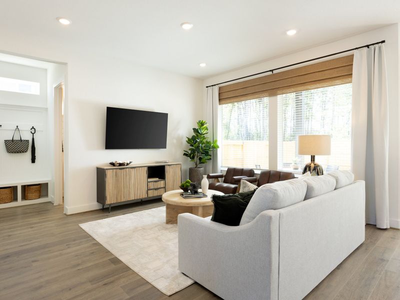 Furnished interior in a model home at Pinewood Trails - Luxe Series in Atascocita (Image 6).