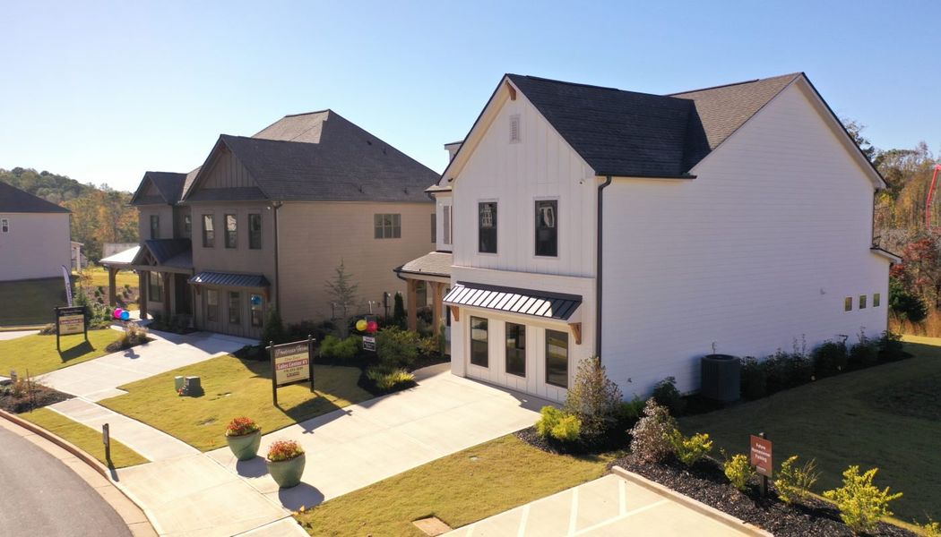 Front exterior of a home in the Ponderosa Farms Reserve community, located in Gainesville, GA (Image 30).