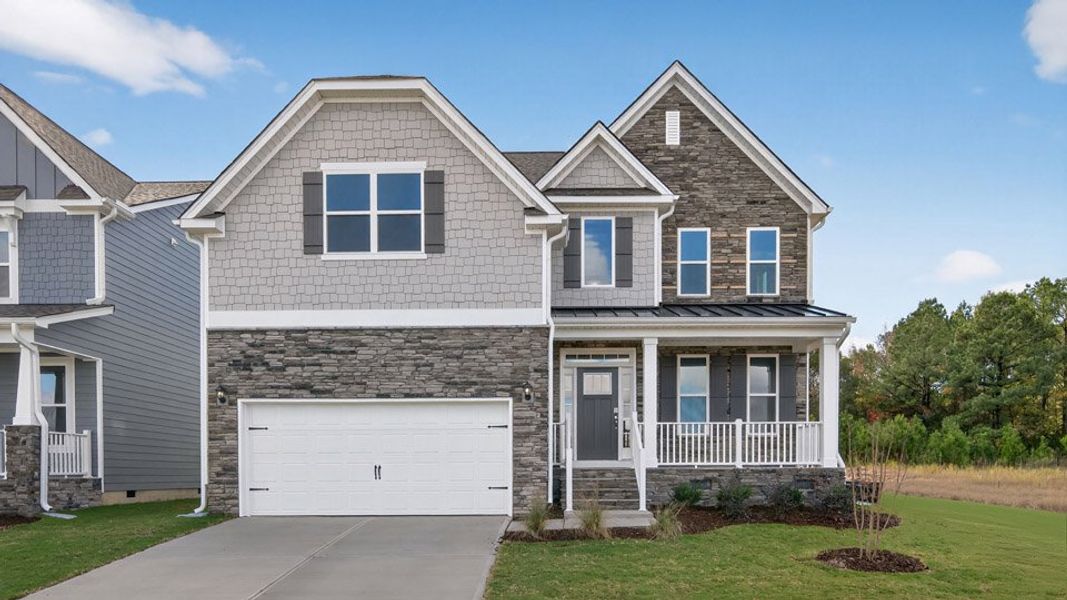 Front exterior of a home in the Kalas Falls community, located in Wake Forest, NC (Image 18). Front exterior of a home in the Kalas Falls community, located in Wake Forest, NC (Image 18).