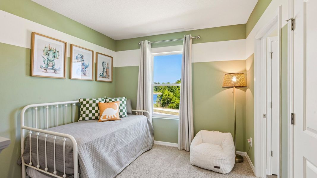 Furnished interior in a model home at Sanctuary at Citrus Park Townhomes in Tampa (Image 23).