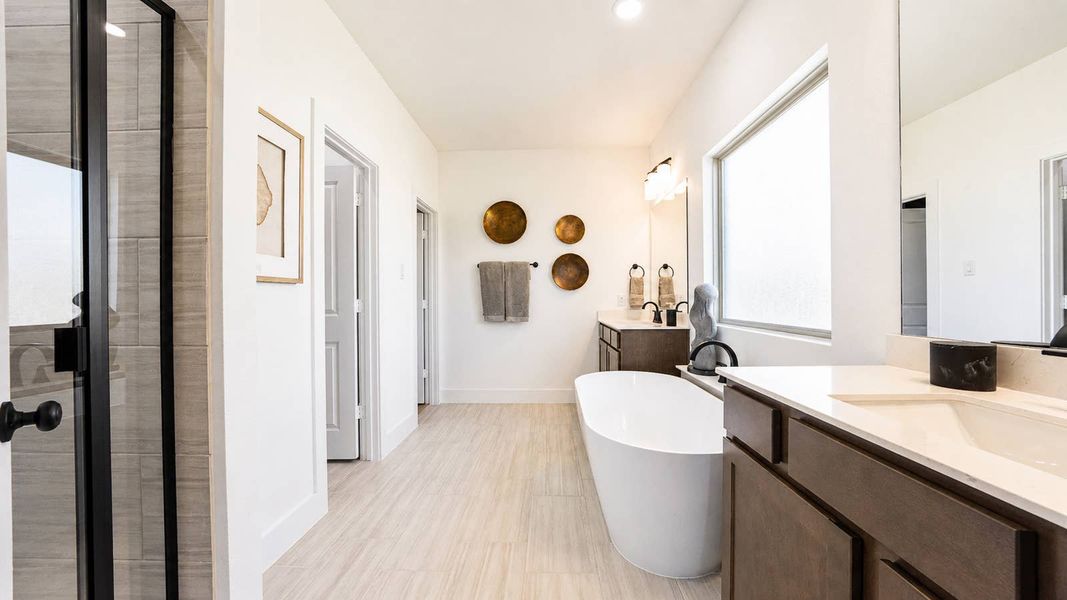 Furnished interior in a model home at Las Lomas in Forney (Image 26).