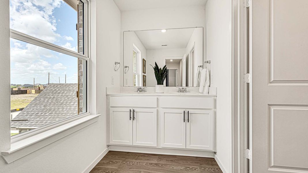 Furnished interior in a model home at August Trails in Needville (Image 23). Furnished interior in a model home at August Trails in Needville (Image 23).
