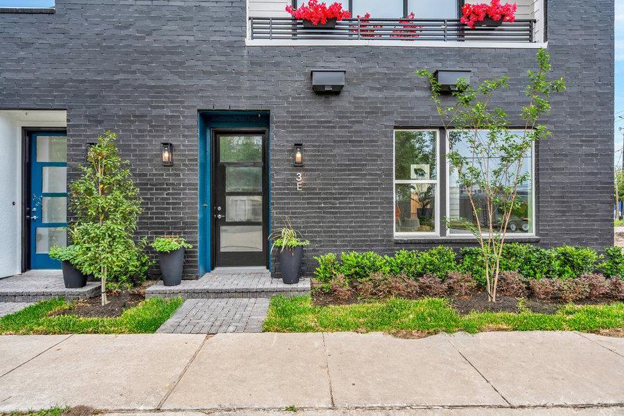 Front exterior of a home in the Commerce Row community, located in Houston, TX (Image 8). Front exterior of a home in the Commerce Row community, located in Houston, TX (Image 8).