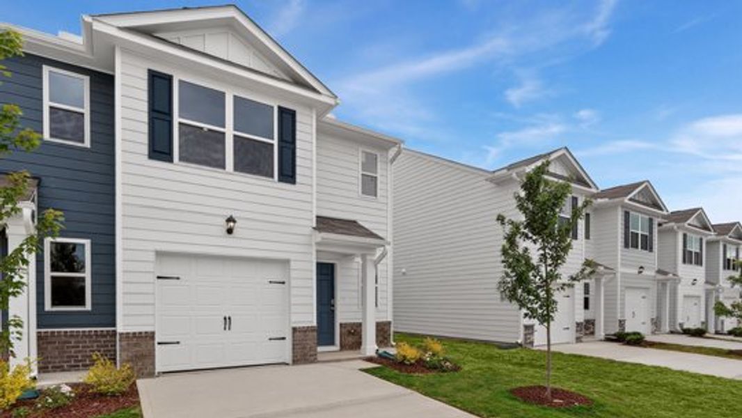 Front exterior of a home in the The Townes at Belle Grove community, located in Wendell, NC (Image 21). Front exterior of a home in the The Townes at Belle Grove community, located in Wendell, NC (Image 21).