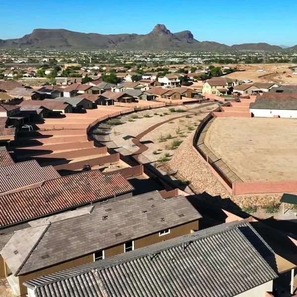 Aerial view of the Colina de Anza Agave community in Tucson, AZ, showing layout and nearby surroundings (Image 1).