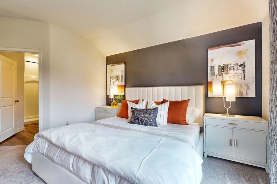 A bedroom with a large bed. A bedroom with a large bed.