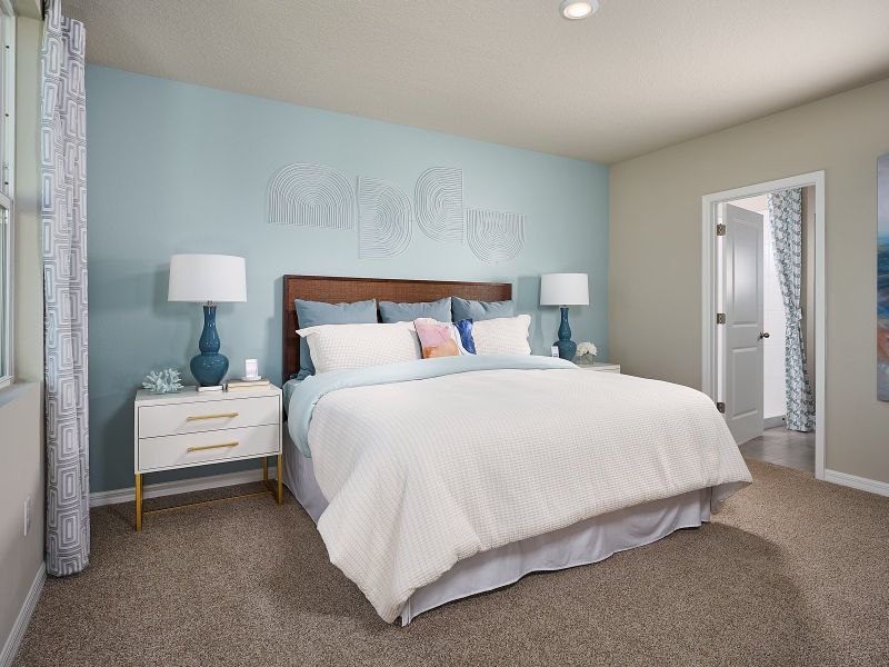 The Yellowstone primary bedroom modeled at Magnolia Bay.