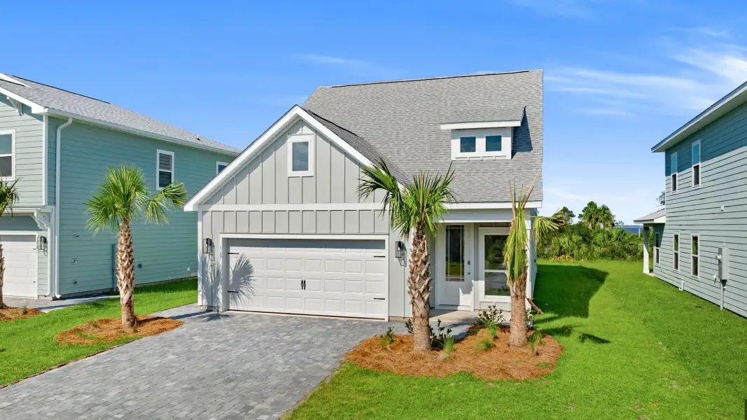 Front exterior of a home in the WindMark Beach Emerald Series community, located in Port Saint Joe, FL (Image 12). Front exterior of a home in the WindMark Beach Emerald Series community, located in Port Saint Joe, FL (Image 12).
