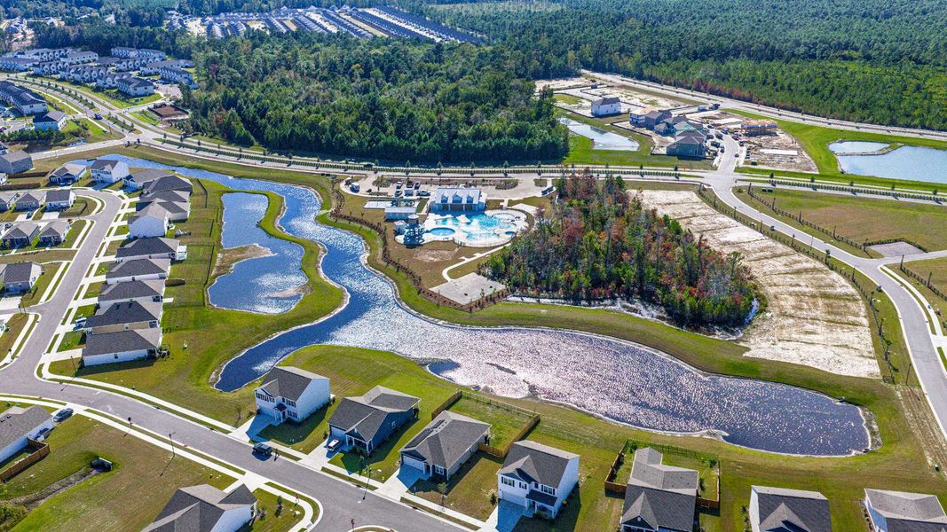Aerial view of the The Pines at Blake Farm community in Wilmington, NC, showing layout and nearby surroundings (Image 12). Aerial view of the The Pines at Blake Farm community in Wilmington, NC, showing layout and nearby surroundings (Image 12).
