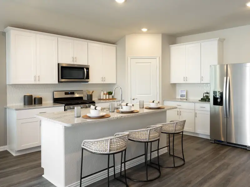 Furnished interior in a model home at River Ridge in Crandall (Image 9).