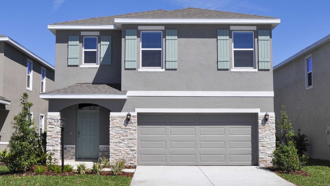Front exterior of a home in the Oakfield Lakes community, located in Parrish, FL (Image 2). Front exterior of a home in the Oakfield Lakes community, located in Parrish, FL (Image 2).