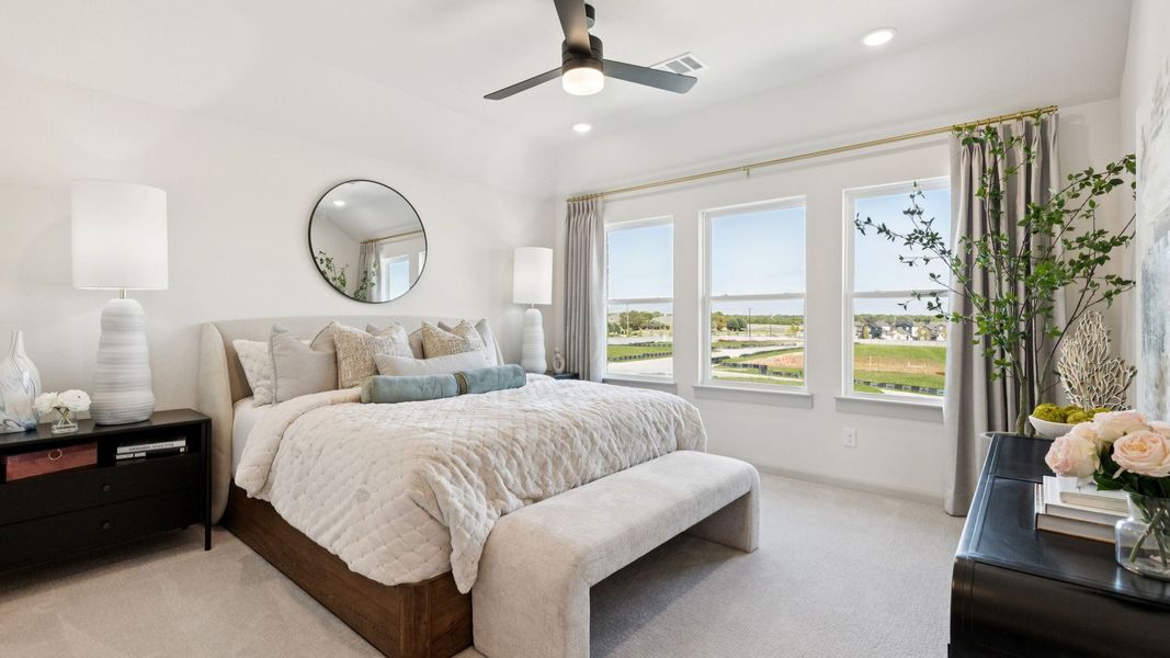 Furnished interior in a model home at Painted Tree - Woodland North in McKinney (Image 22).