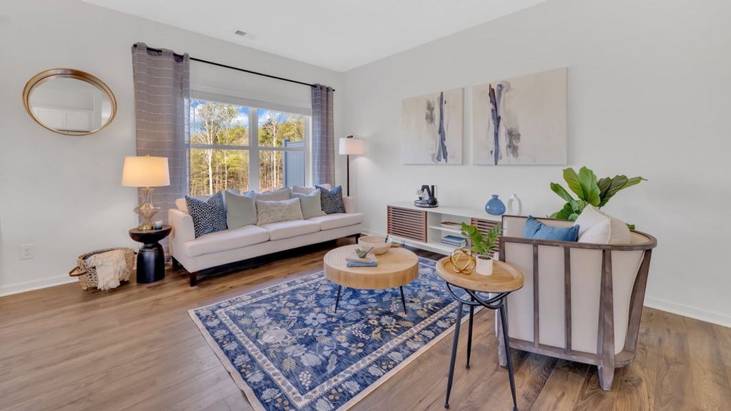 Furnished interior in a model home at Cherokee Crossing in Kodak (Image 6).