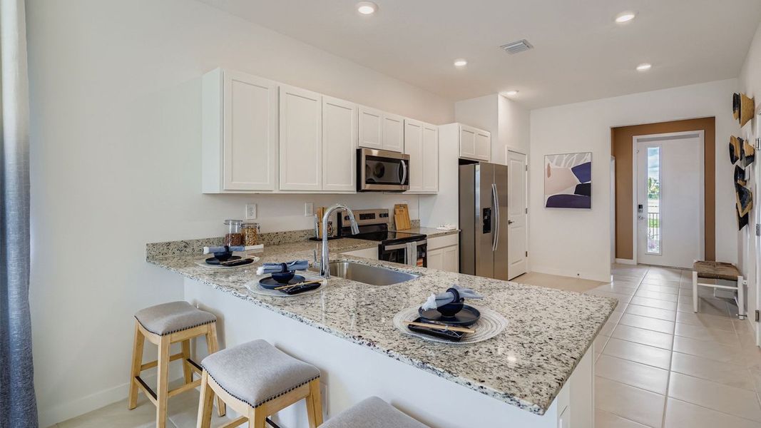 Furnished interior in a model home at Baywood II in Florida City (Image 16).