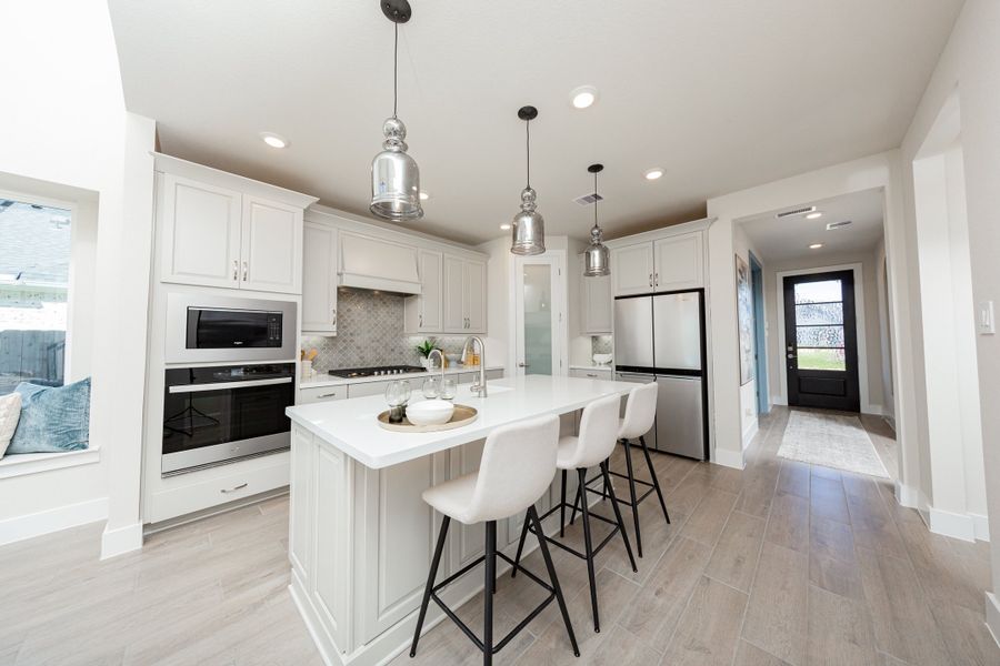 Furnished interior in a model home at Arabella on the Prairie in Richmond (Image 6).