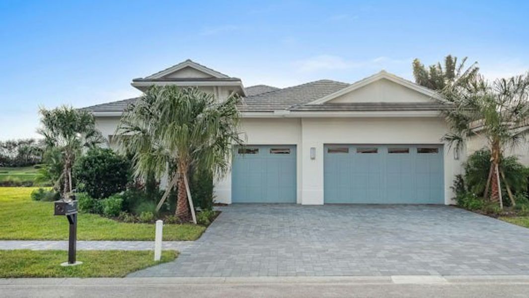 Front exterior of a home in the Tesoro Club community, located in Port St. Lucie, FL (Image 28).