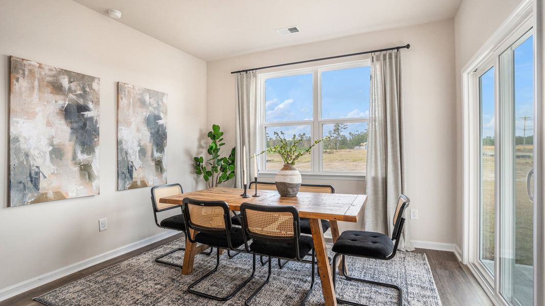 Furnished interior in a model home at Pinewood Estates in Conway (Image 9).