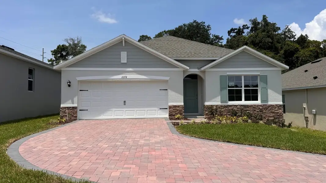 Front exterior of a home in the Sagewood community, located in Apopka, FL (Image 3).