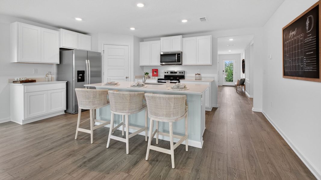 Furnished interior in a model home at Sawmill Branch in Palm Coast (Image 40).