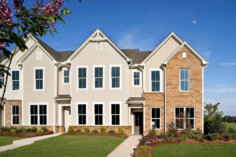 Front exterior of a home in the The Townes at Cadia Village community, located in Matthews, NC (Image 2). Front exterior of a home in the The Townes at Cadia Village community, located in Matthews, NC (Image 2).