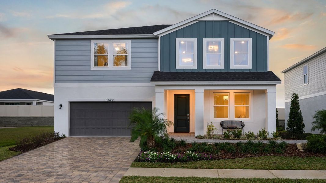 Front exterior of a home in the Pasadena Woods community, located in Dade City, FL (Image 3).