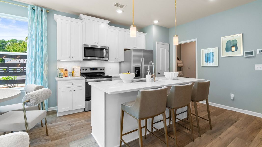 Furnished interior in a model home at McClure Farms Townhomes in Columbia (Image 5).