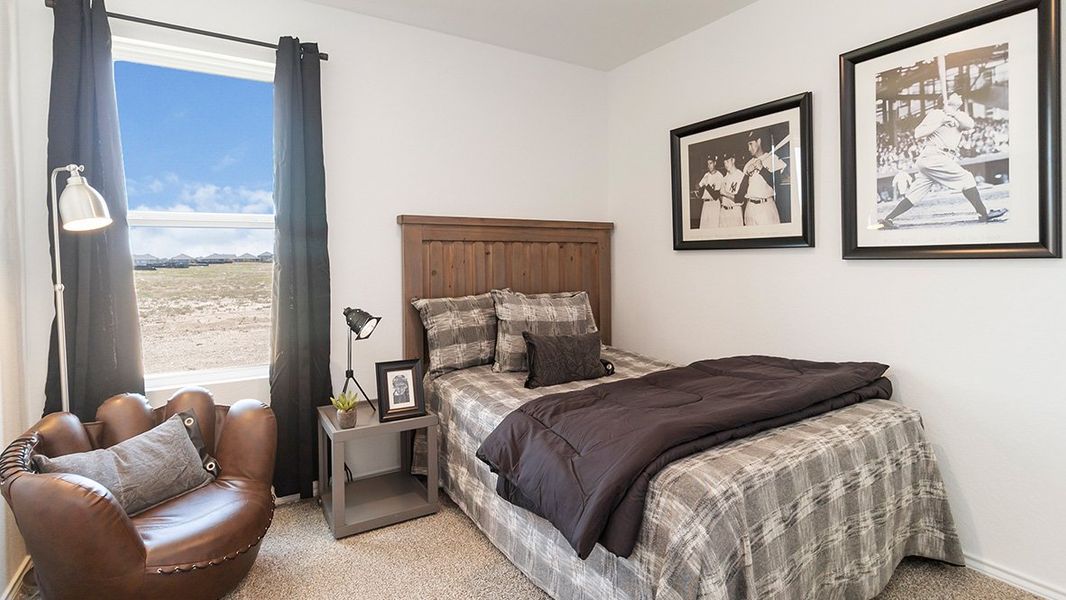 Furnished interior in a model home at Preserve at Medina in Von Ormy (Image 38).