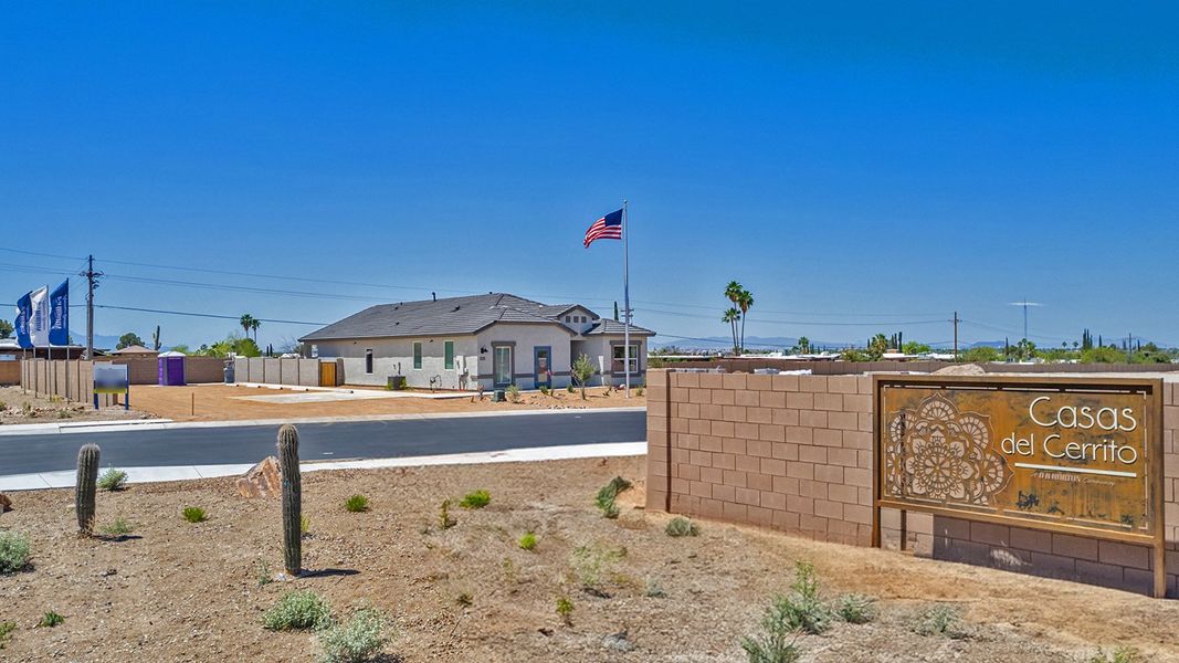 Entrance to the Casas del Cerrito community in Tucson, AZ, featuring signage and landscaping (Image 9).