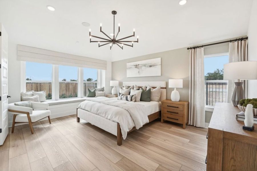 Furnished interior in a model home at Grande Estates in Bertram (Image 6).