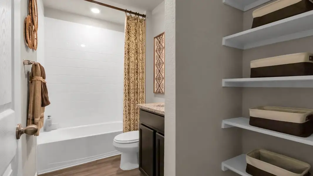 Furnished interior in a model home at Park Meadows in Lorena (Image 5).