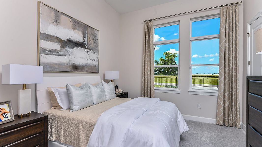 Furnished interior in a model home at Esplanade by the Islands in Naples (Image 51).