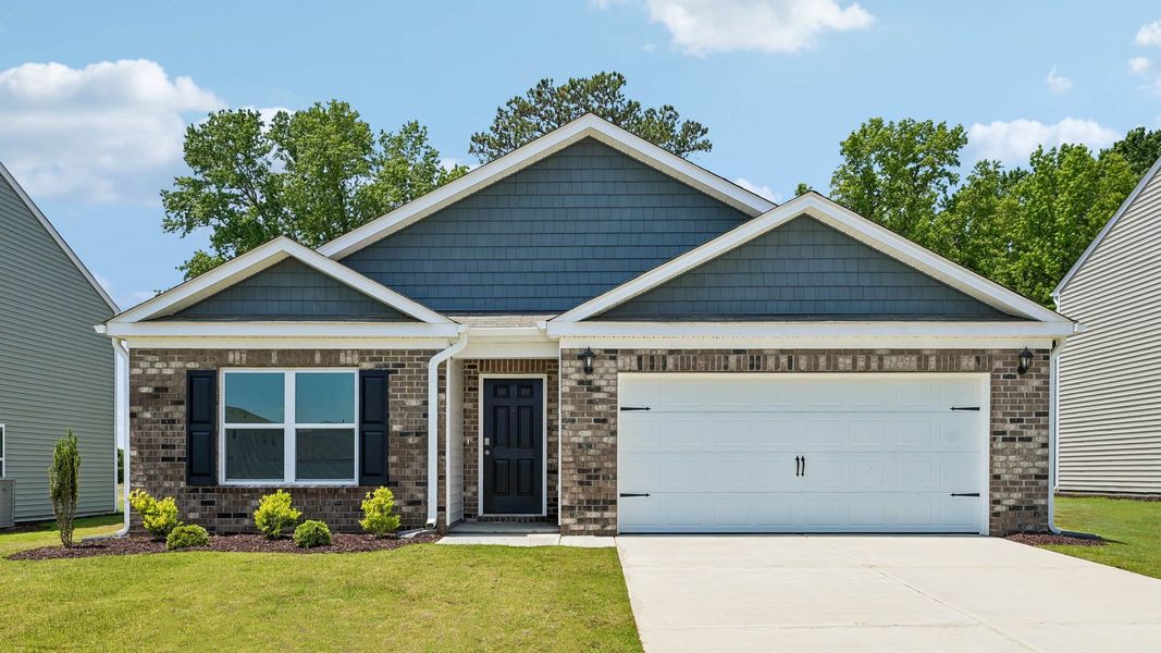 Front exterior of a home in the Wilson's Ridge community, located in Wilson's Mills, NC (Image 5). Front exterior of a home in the Wilson's Ridge community, located in Wilson's Mills, NC (Image 5).