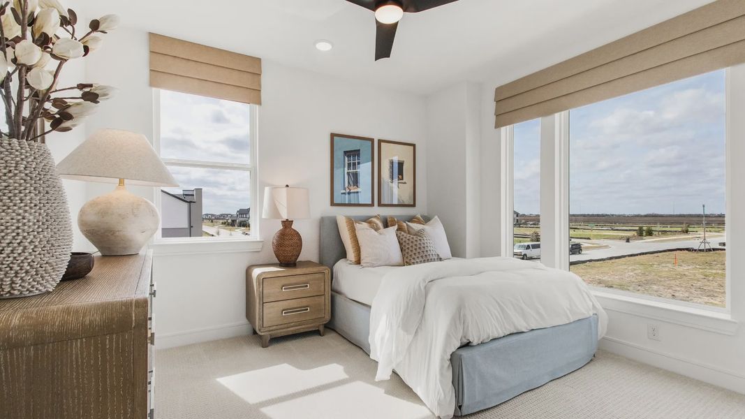 Furnished interior in a model home at Bridgeland Central in Cypress (Image 40).