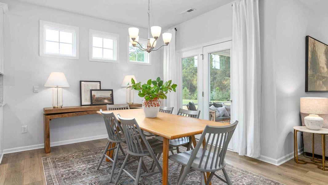 Furnished interior in a model home at Quarry Hills - Freedom in Swepsonville (Image 10).