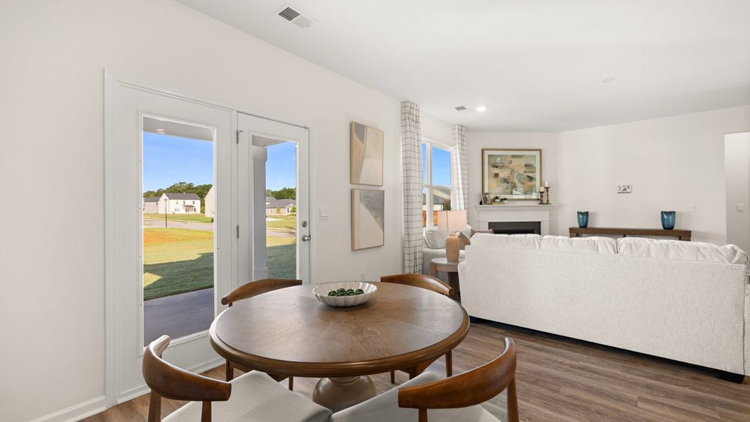 Furnished interior in a model home at Preserve at Dove Creek in Statham (Image 13).