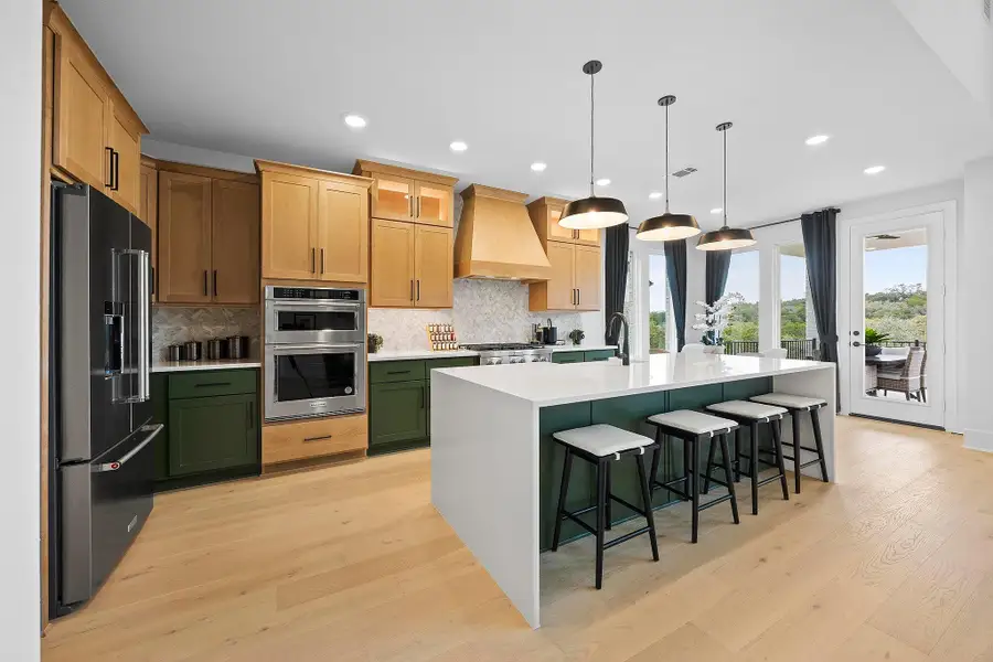 Furnished interior in a model home at New Haven - 60' in Manor (Image 19).