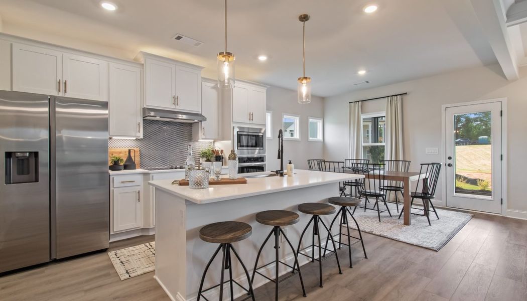 Furnished interior in a model home at Kentmere in Auburn (Image 30).