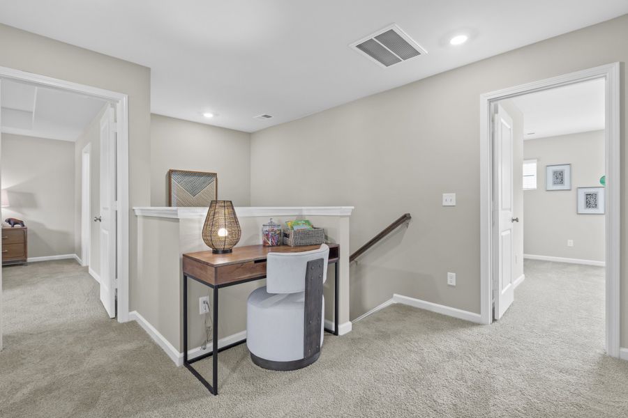 Furnished interior in a model home at Harmon Terrace in Hopkins (Image 22).