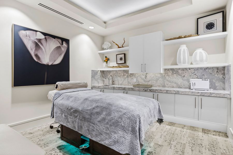 Furnished interior in a model home at Valencia Del Mar (55+) in Boynton Beach (Image 5).