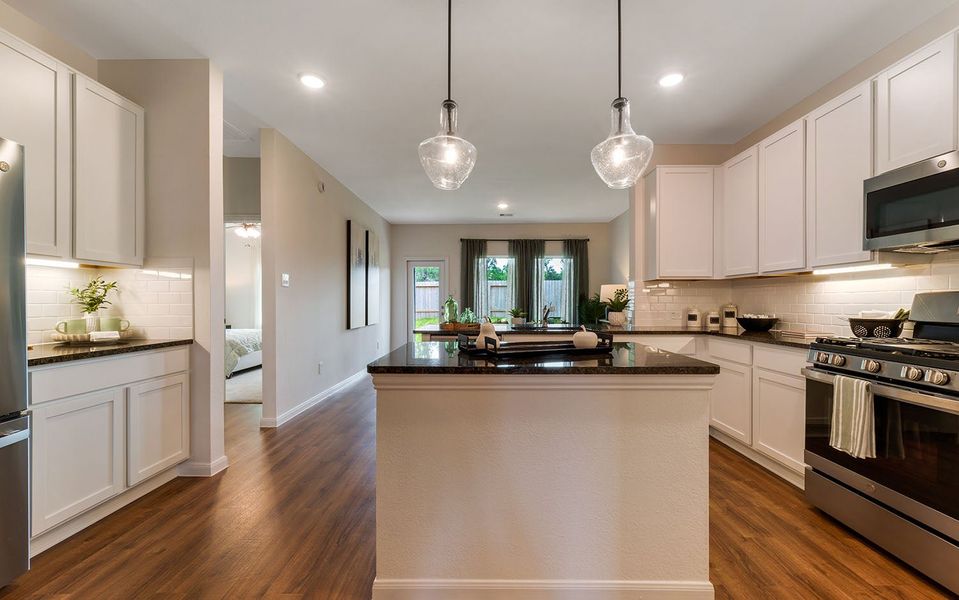 Furnished interior in a model home at The Pines at Seven Coves in Willis (Image 21).