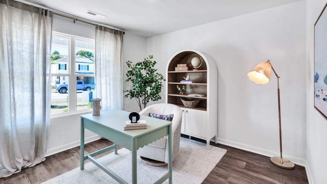 Furnished interior in a model home at Driftwood in Richlands (Image 12).