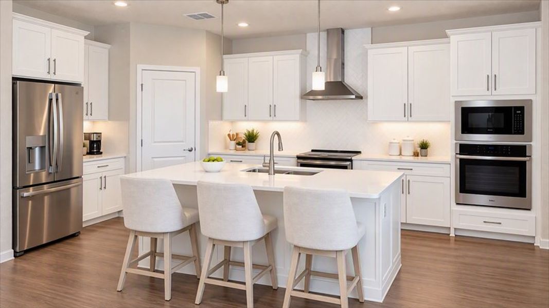 Step into an home that fits your life with open concept, main level living, & kitchens for hosting.