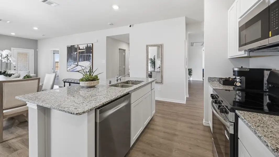 Furnished interior in a model home at Sanger Circle in Sanger (Image 7).
