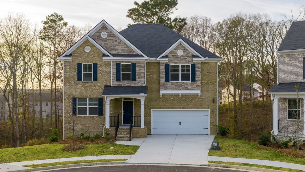 Front exterior of a home in the Brooks Station community, located in Dacula, GA (Image 10).