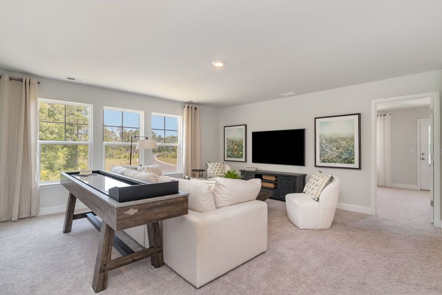 Furnished interior in a model home at Waterbridge in Myrtle Beach (Image 47).