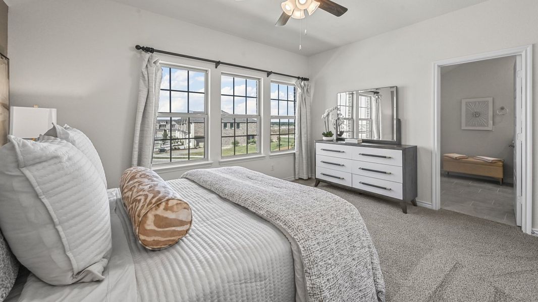 Furnished interior in a model home at The Villages of Hurricane Creek Townhomes in Anna (Image 26). Furnished interior in a model home at The Villages of Hurricane Creek Townhomes in Anna (Image 26).