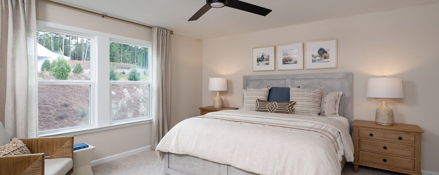 Furnished interior in a model home at Eastlyn Crossing - Townhomes in Flowery Branch (Image 8). Furnished interior in a model home at Eastlyn Crossing - Townhomes in Flowery Branch (Image 8).