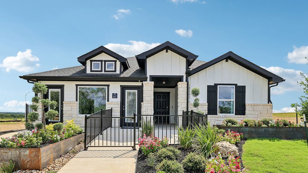 Front exterior of a home in the Revelry community, located in Del Valle, TX (Image 2). Front exterior of a home in the Revelry community, located in Del Valle, TX (Image 2).
